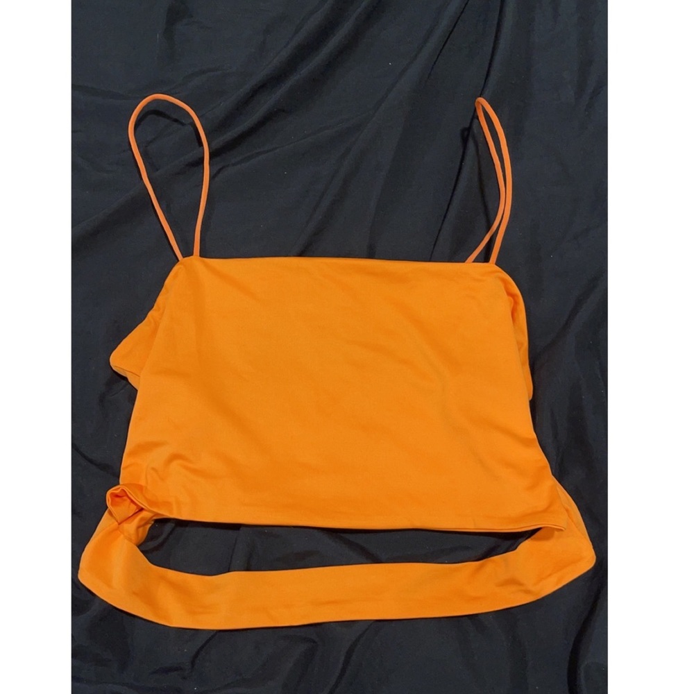 Bright orange size large fits like a medium. i love this party too.